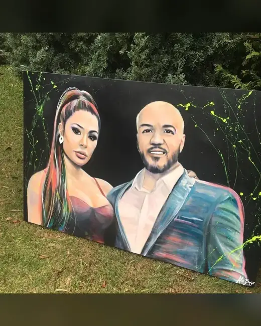 Belo e Gracyanne com o retrato pintado por Ale Baggio
