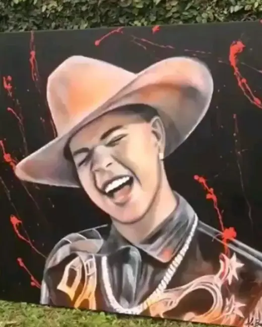 Jottape com o retrato pintado por Ale Baggio