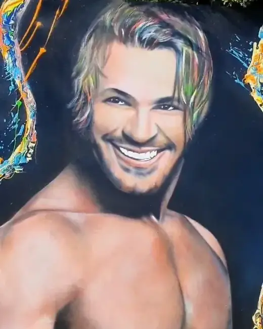 Eduardo Costa com o retrato pintado por Ale Baggio